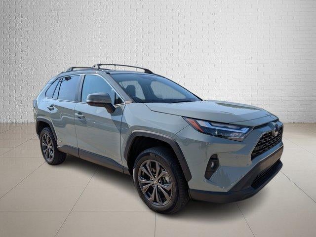 2023 Toyota RAV4 Hybrid XLE Premium in Lunar Rock — front three-quarter view
