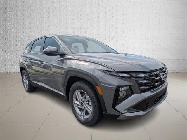 2026 Hyundai TUCSON SE FWD in Hampton Gray — front three-quarter view