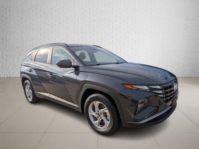 2024 Hyundai TUCSON SEL in Dark Gray Metallic — front three-quarter view
